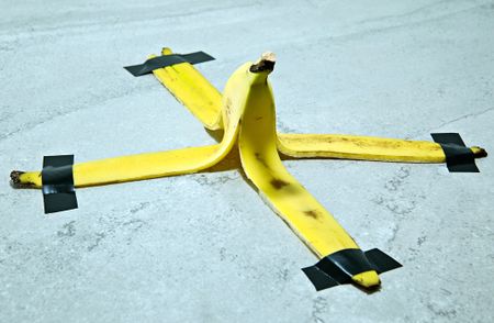 Banana peel taped down to the floor.
