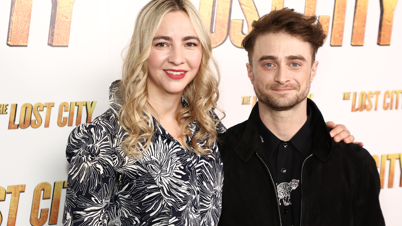 Erin Darke and Daniel Radcliffe attend a screening of &quot;The Lost City&quot; at the Whitby Hotel on March 14, 2022 in New York City.