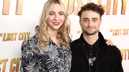 Erin Darke and Daniel Radcliffe attend a screening of "The Lost City" at the Whitby Hotel on March 14, 2022 in New York City.