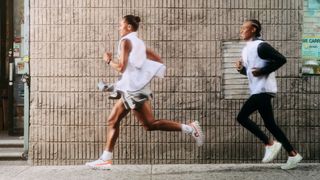Two people running in On running shoes 