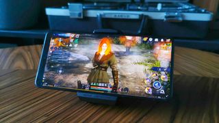 ASUS ROG Phone 8 Pro with Black Desert character on screen