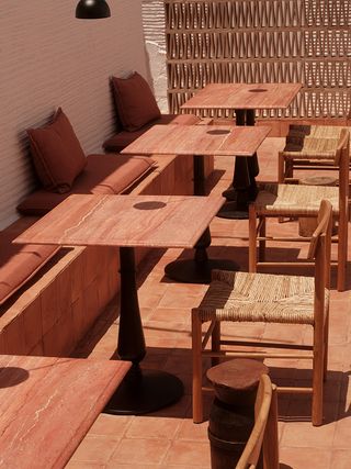 close up of wooden chairs and tables at Bardot in Antiparos