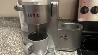 Keurig K-Café Special Edition pouring a coffee with k-cup on countertop