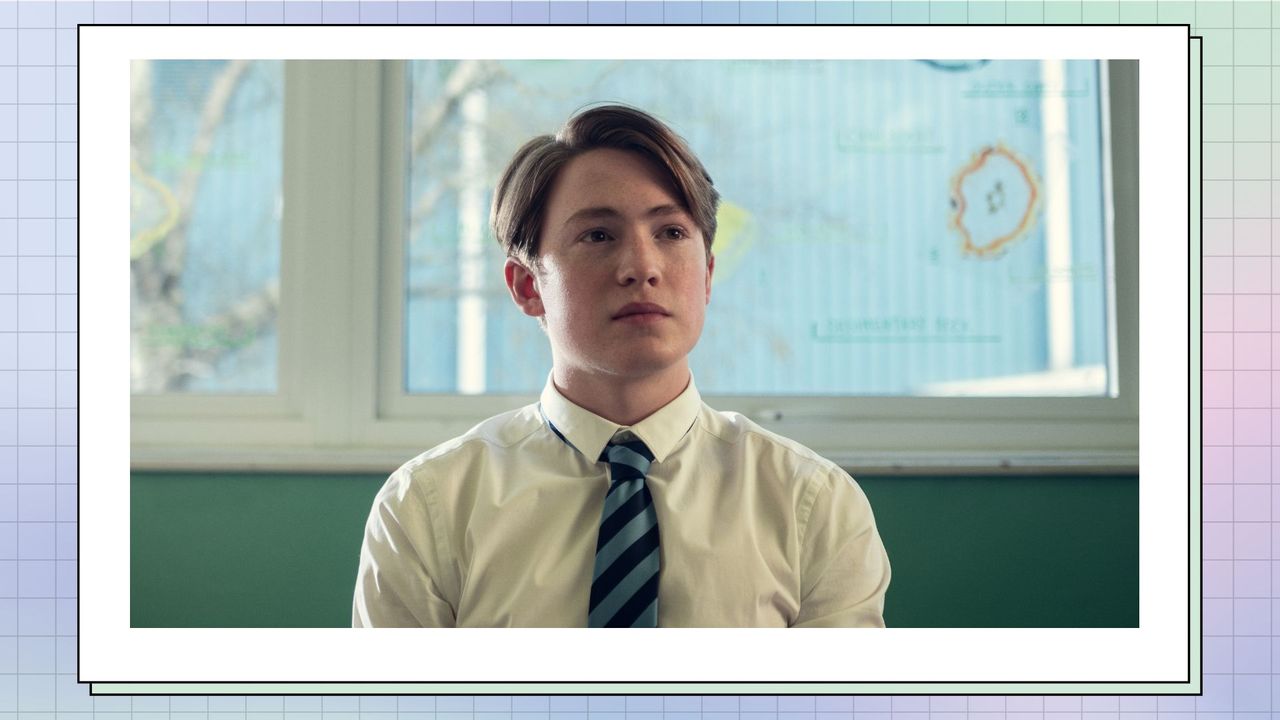 Kit Connor as Nick Nelson in Heartstopper/ Netflix - in a pastel blue, lilac and pink background