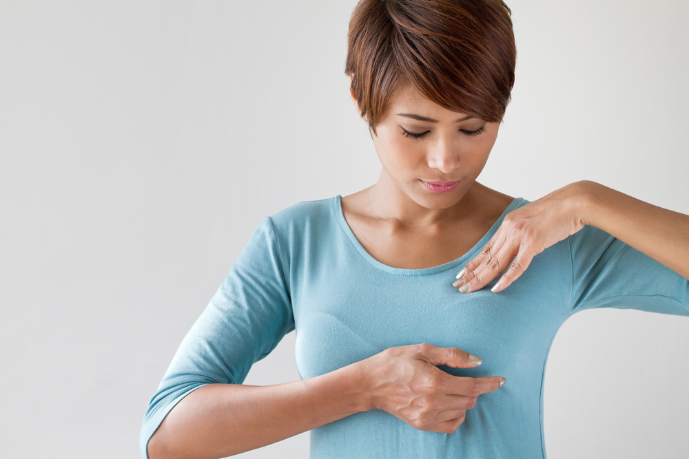 Woman self breast exam, breast cancer