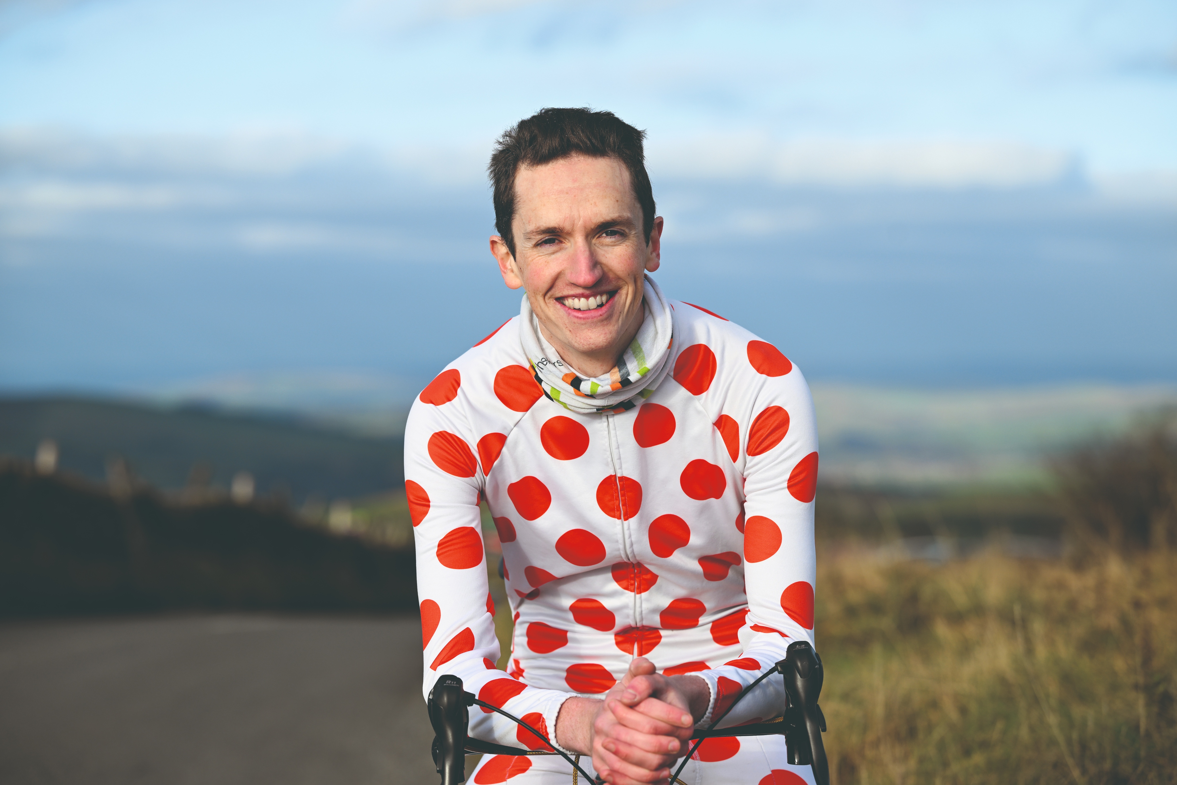 Bhima Bowden in a polka dot shirt