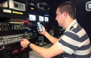 Chris Medtvedt, News Operations Manager for 5 Eyewitness News sets up Comrex EarShot IFB.