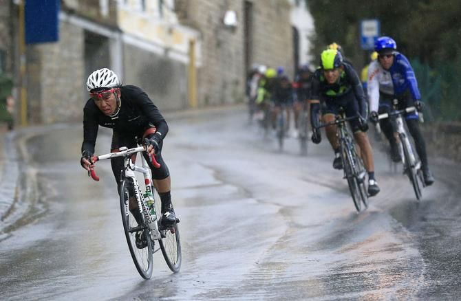 Riders negotiate a wet descent