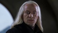 Lucius Malfoy (Jason Isaacs) speaks to Dobby in Harry Potter and the Chamber of Secrets.