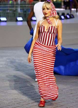 Sabrina Carpenter walking the runway at Vogue World