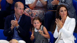 Prince William, Duke of Cambridge, Princess Charlotte of Cambridge and Catherine, Duchess of Cambridge watch the swimming competition at the Sandwell Aquatics Centre during the 2022 Commonwealth Games on August 2, 2022 in Birmingham, England