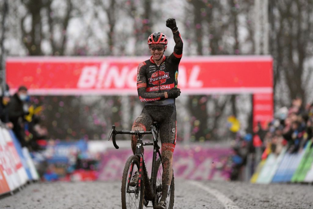 NAMUR BELGIUM DECEMBER 19 Michael Vanthourenhout of Belgium and Team Pauwels Sauzen Bingoal celebrates winning during the 13th Namur UCI CycloCross Worldcup 2021 Mens Elite UCIWT on December 19 2021 in Namur Belgium Photo by Luc ClaessenGetty Images