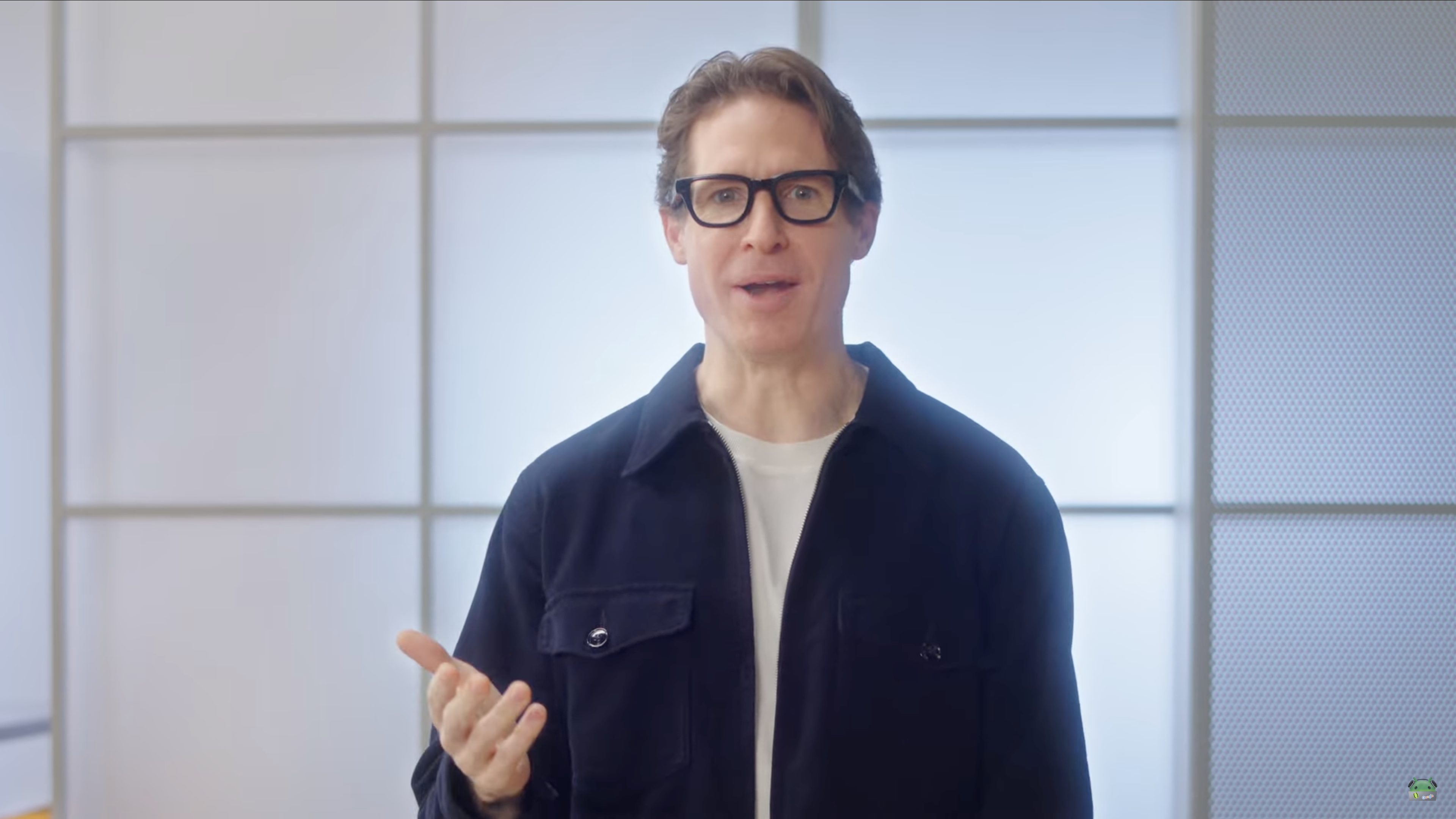 A still from the Android Show: XR Edition showing Juston Payne wearing the Google prototype glasses