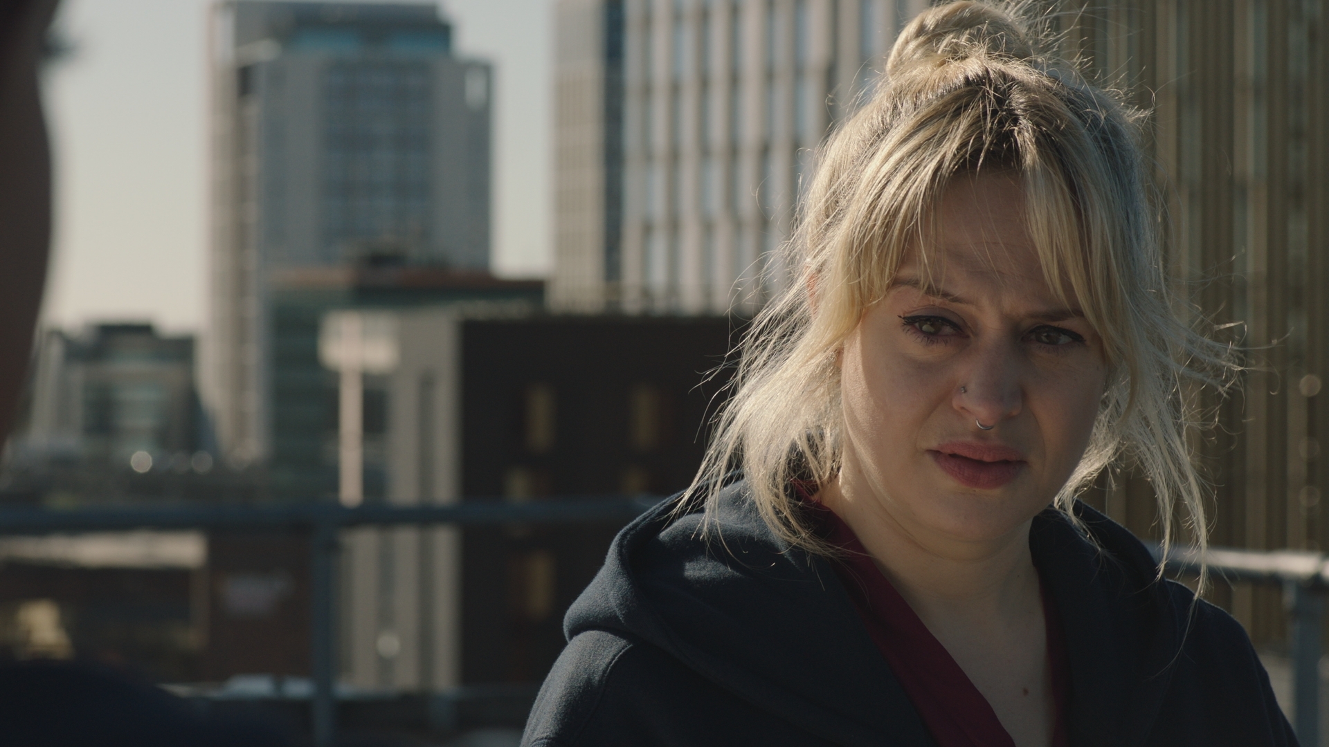 Tearful Nicole talks to Rida on the hospital roof.