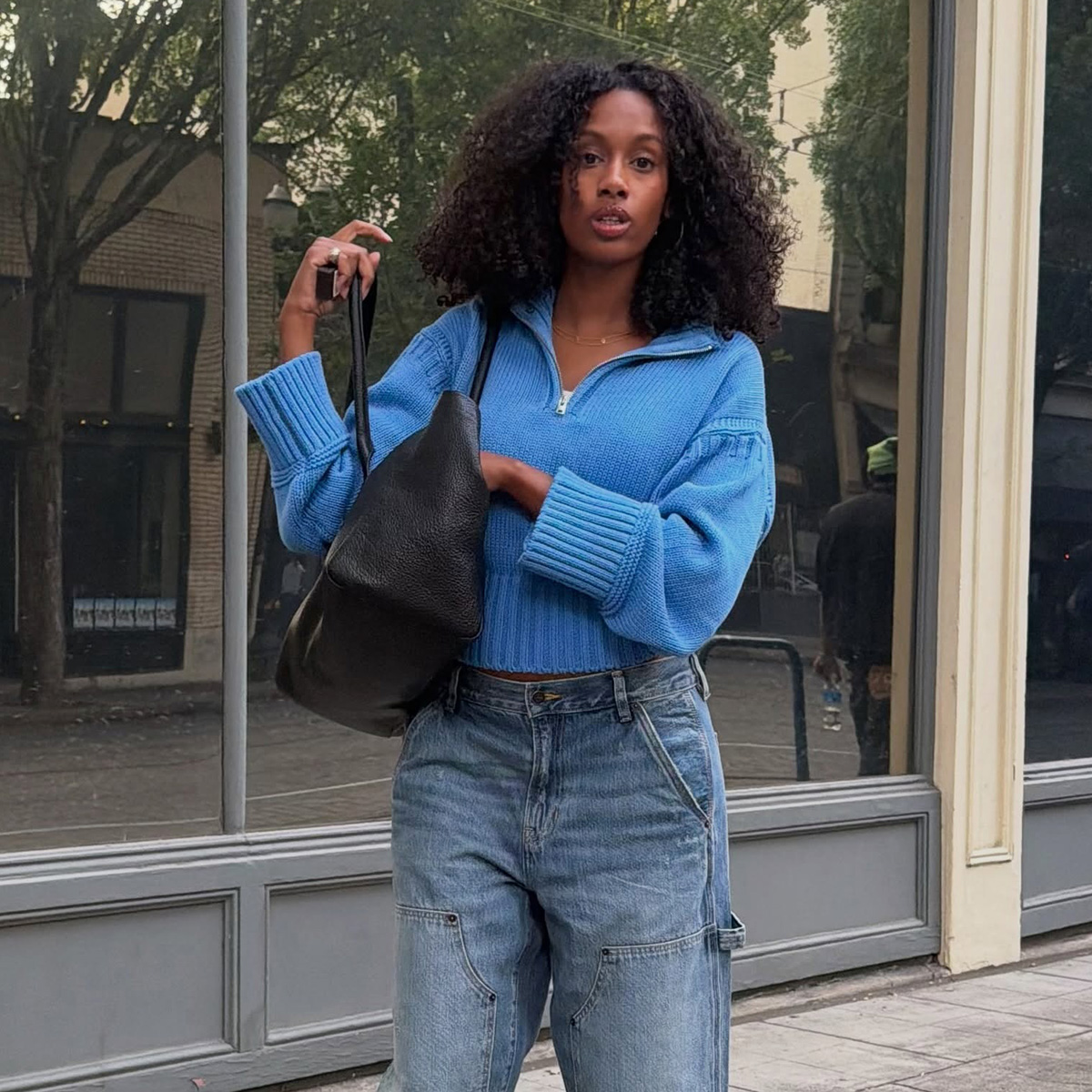 Influencer Claire Most wearing J.Crew Tiny Rollneck Sweater in blue