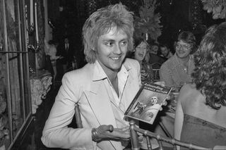 Roger Taylor with a copy of Astounding Science Fiction
