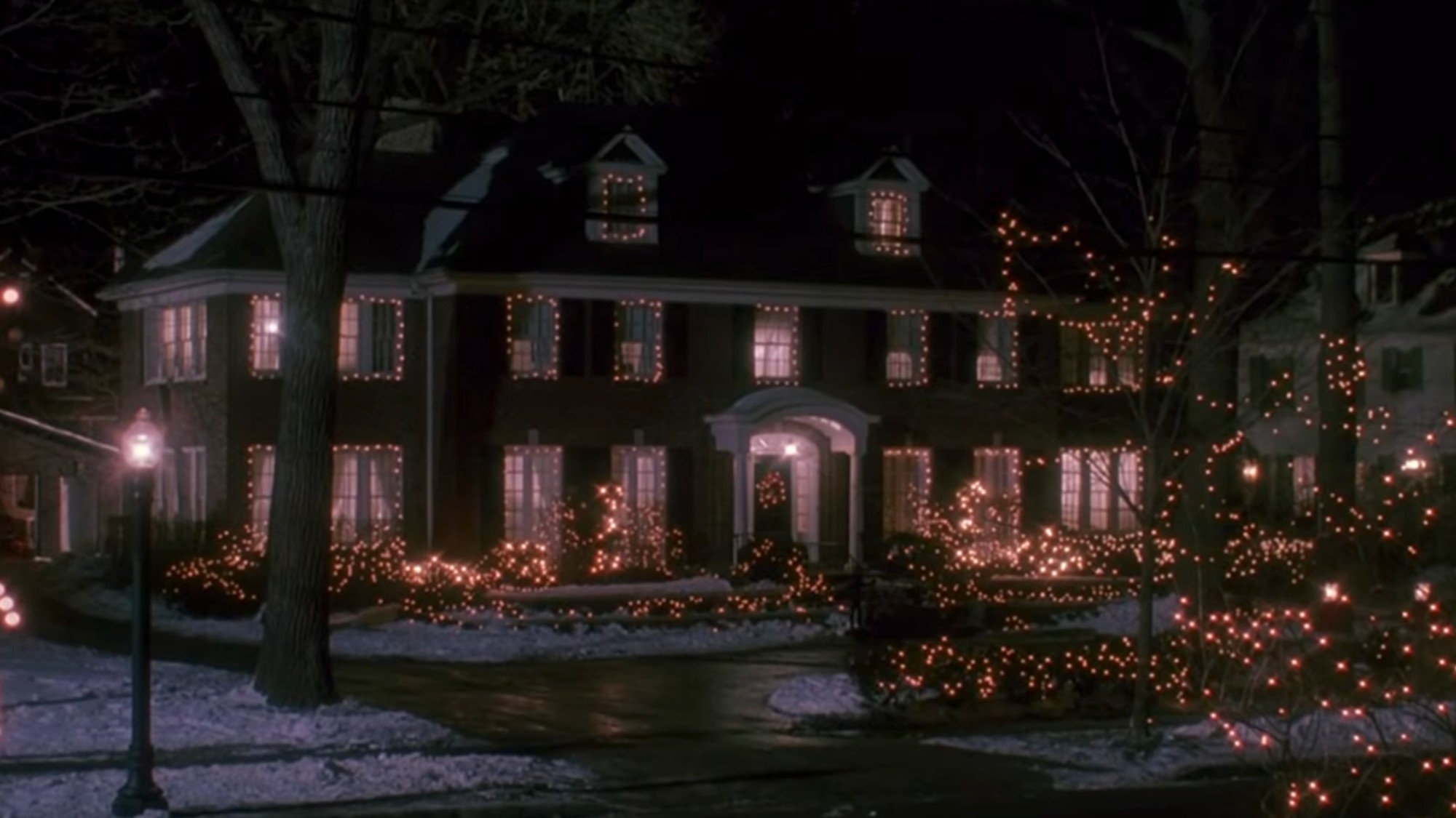 The exterior of the house in Home Alone at night.