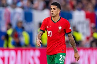 Joao Cancelo of Portugal in action against France in the quarter-final of Euro 2024