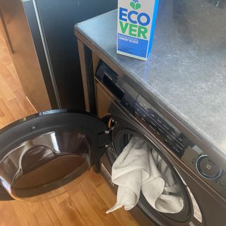 Image of Ecover laundry bleach being used as cleaning hack