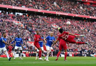 Luis Diaz, right, attempts a bicycle kick which led to Divock Origi's goal against Everton