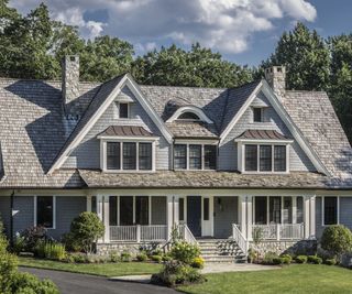 Exterior of new england style home in gray and white