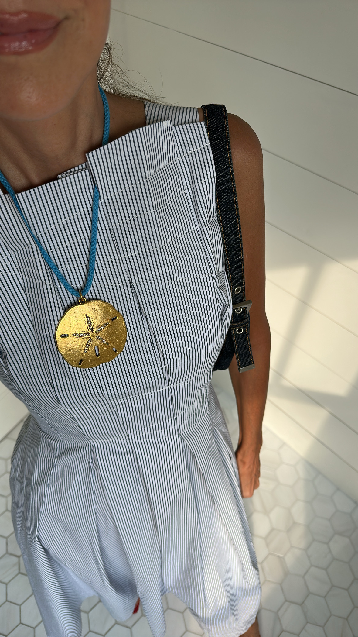 Larissa Mills models a vertical-stripe structured top