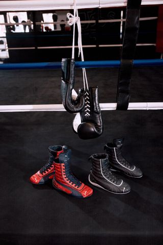 The boxing sneaker trend seen with LaQuan Smith x Puma collaboration of Puma's Speedcat Mid sneakers