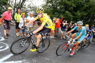 Chris Froome climbs with Fabio Aru on his wheel during stage 19