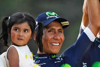 Nairo Quintana and daughter Mariana on the podium at the Tour de France