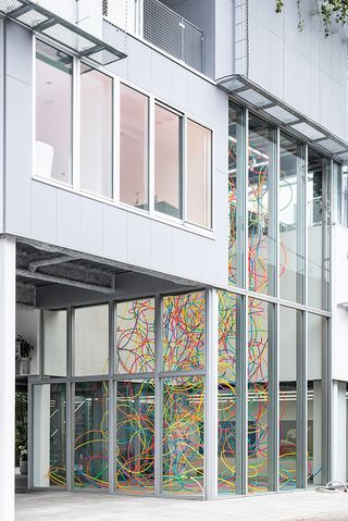 exterior detail of glass and metal grid at Maebashi Galleria by akihisa hirata
