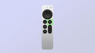 The TV button on the Apple TV remote is highlighted with a green box