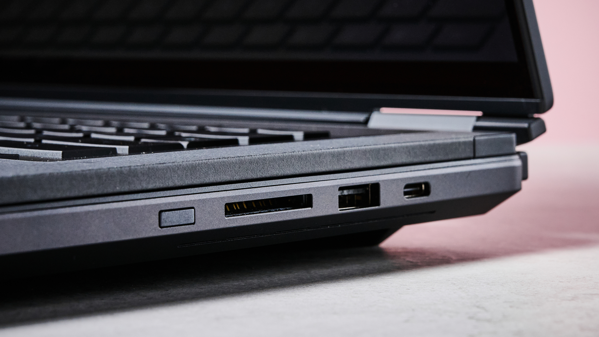 Close-up of ports on right-hand side of ASUS ROG Zephyrus Duo 2026 with pink wall in background