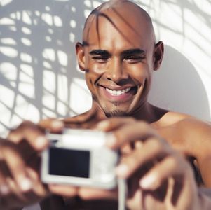 man taking photo of himself