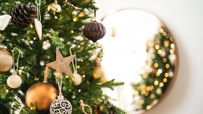 Close up of Christmas tree with gold decorations