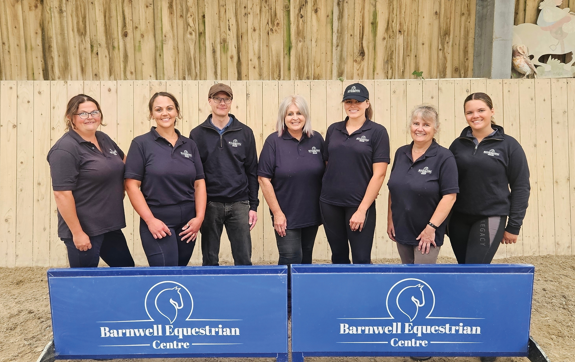 A group of riding instructors and staff from Barnwell Riding School