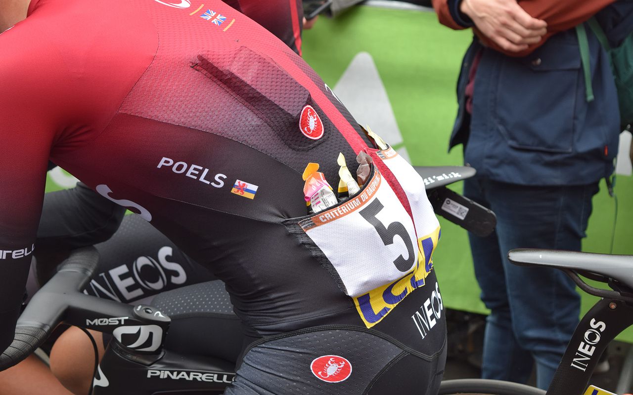 Most race jerseys now feature pockets stiched to the inside of the jersey to stow the race radio securely