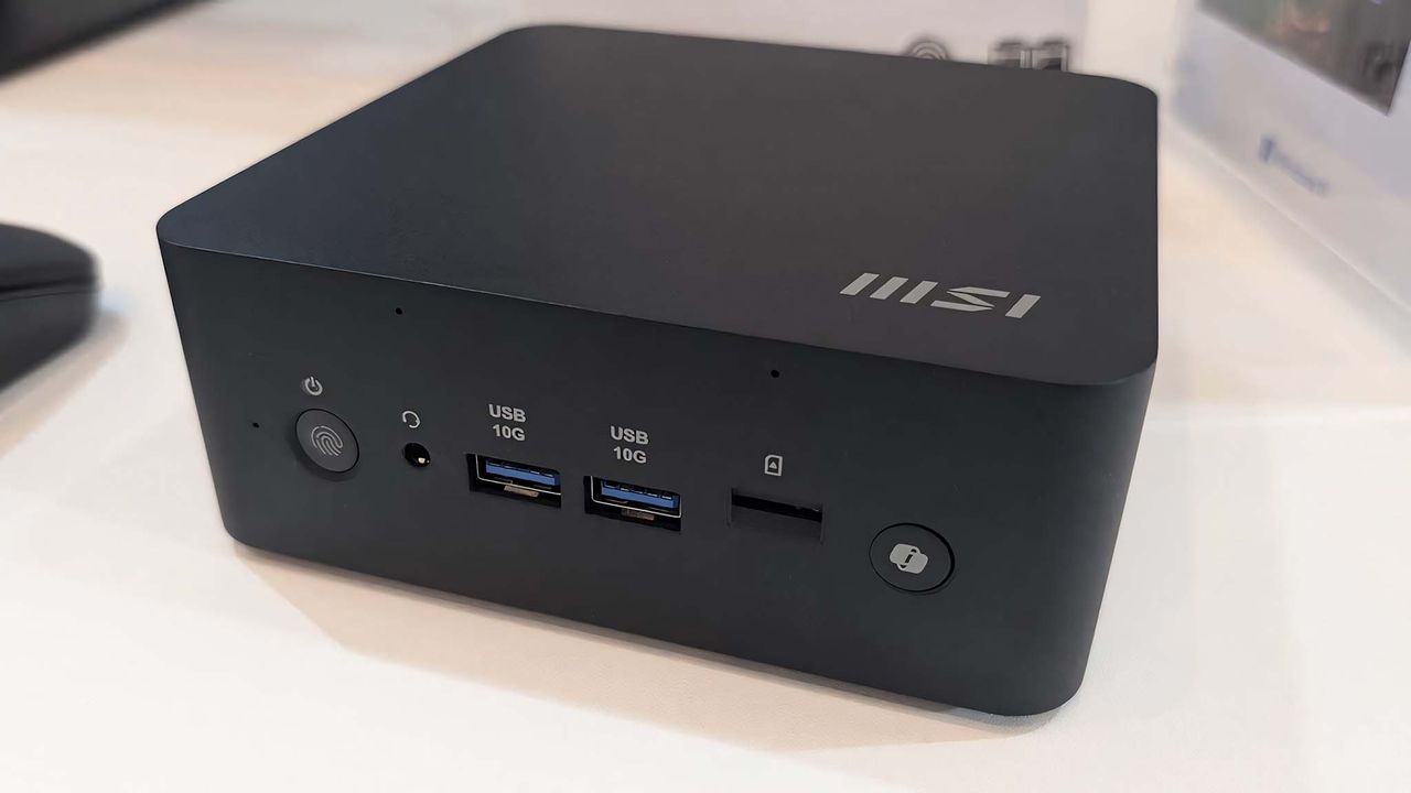 Front side of MSI Cubi NUC AI+ 2M on a white table.
