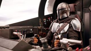 An image from Lucasfilm/Disney shows the Mandalorian in full Beskar armor.