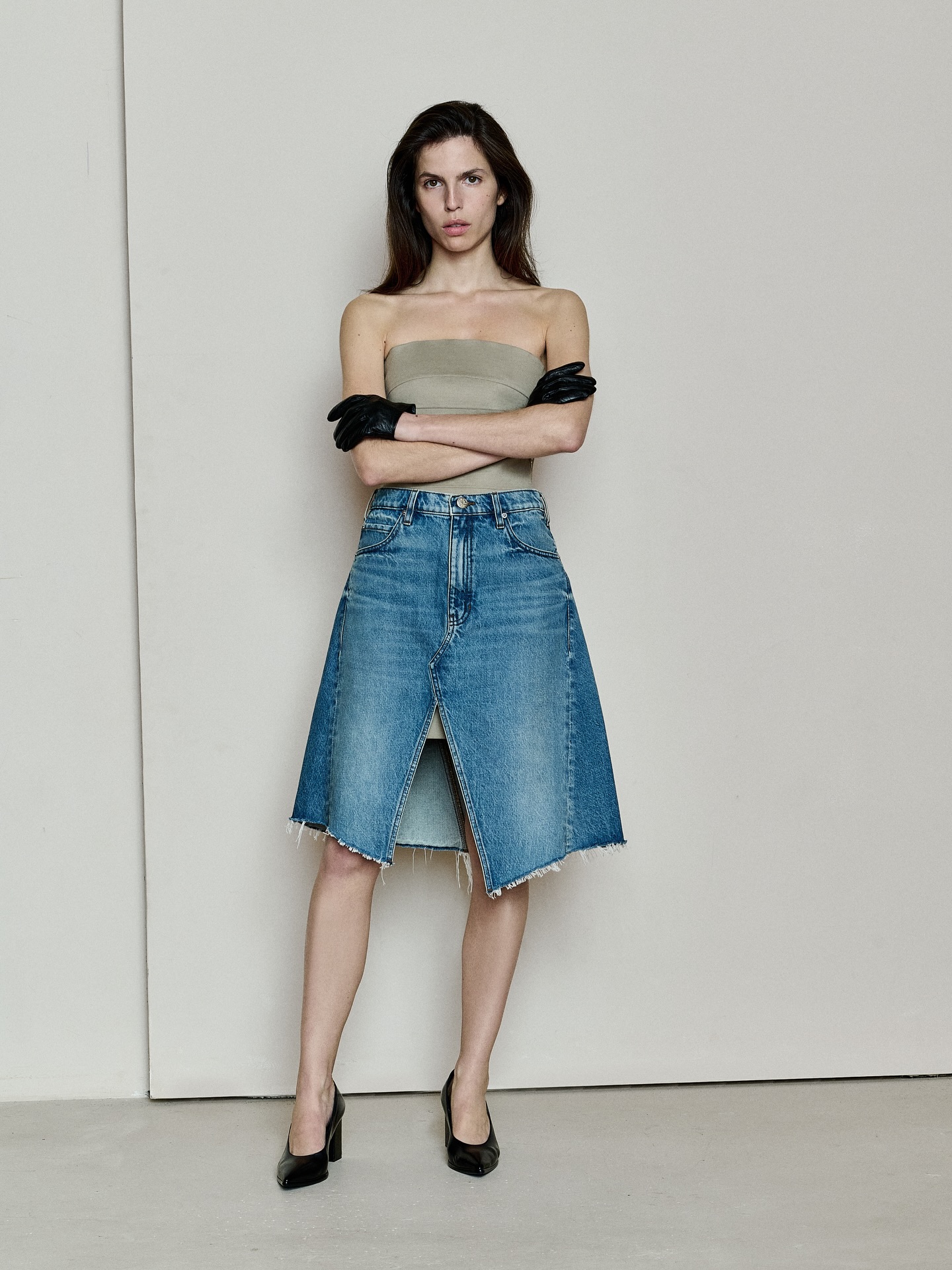 Image of model wearing denim skirt by Dala