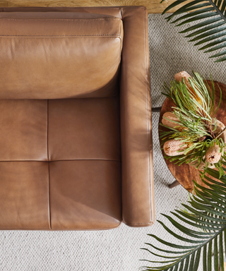 Brown leather sofa with square arm