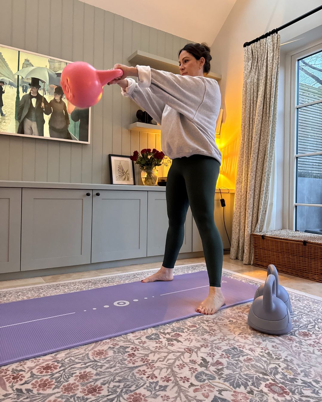 Health Writer Anna trying the 7-7-7 kettlebell workout