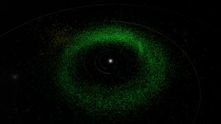 a bright dot in the center is orbited on all sides by innumerous small green points among black space.