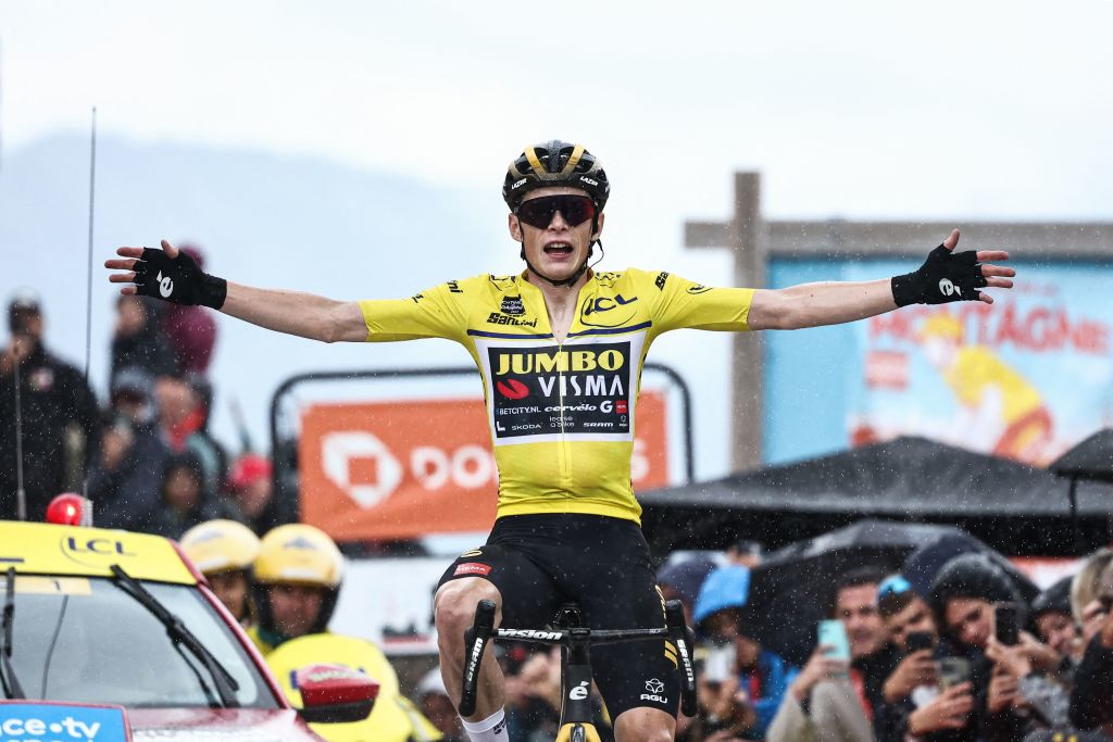 JumboVismas Danish rider Jonas Vingegaard celebrates as he crosses the finish line during the seventh stage of the 75th edition of the Criterium du Dauphine cycling race 148km between Port de Savoie to Col de la Croix de Fer Saint Sorlin France on June 10 2023 Photo by AnneChristine POUJOULAT AFP Photo by ANNECHRISTINE POUJOULATAFP via Getty Images