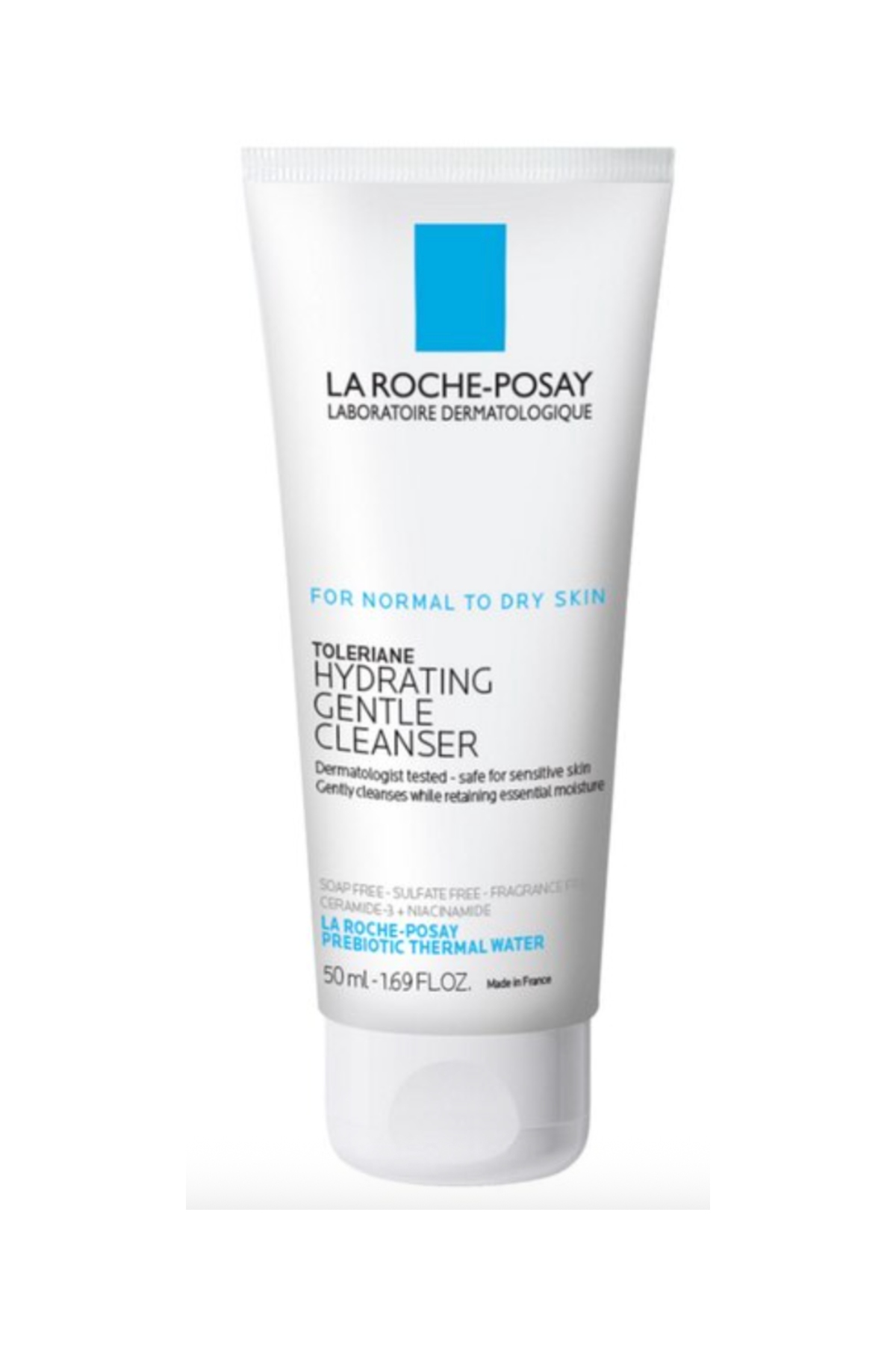 A white and blue bottle of face wash with black writing