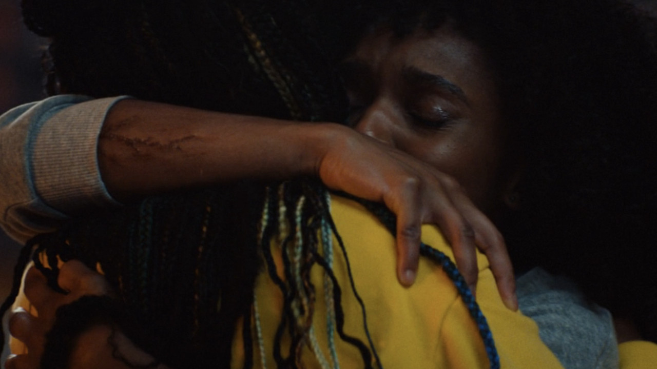 Riri Williams (Dominique Thorne) hugs Natalie Washington (Lyric Ross) on Ironheart
