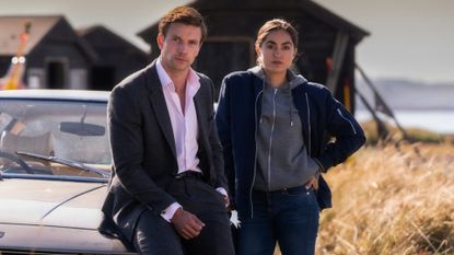 The cast of Lynley sit on the bonnet of a car