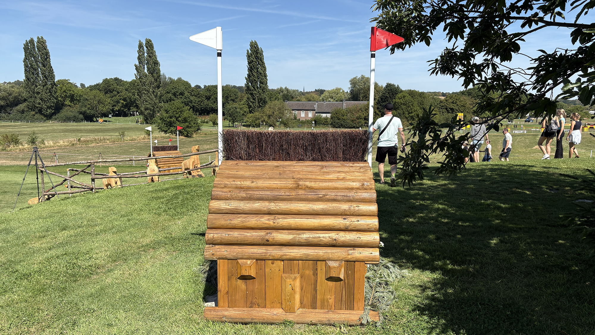 A narrow fence topped with brush on the eventing World Championships cross-country course in Aachen