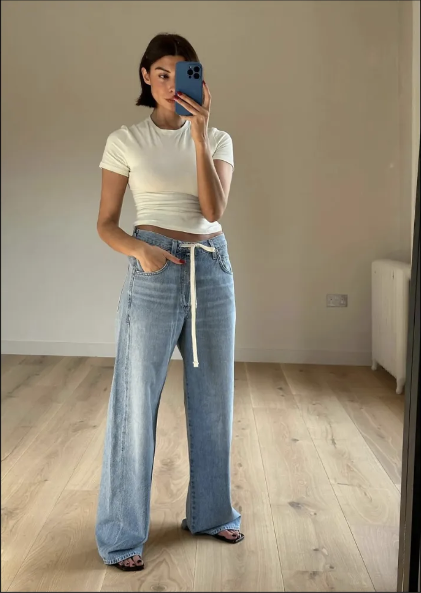 Fashion person Marinna wears the drawstring jean trend in a recent image from her Instagram.