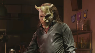 The Grabber standing in camp building with Gwen in Black Phone 2