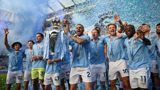 Kyle Walker of Manchester City lifts the Premier League Trophy after their team&#039;s victory during the Premier League match between Manchester City and West Ham United at Etihad Stadium on May 19, 2024 in Manchester, England.